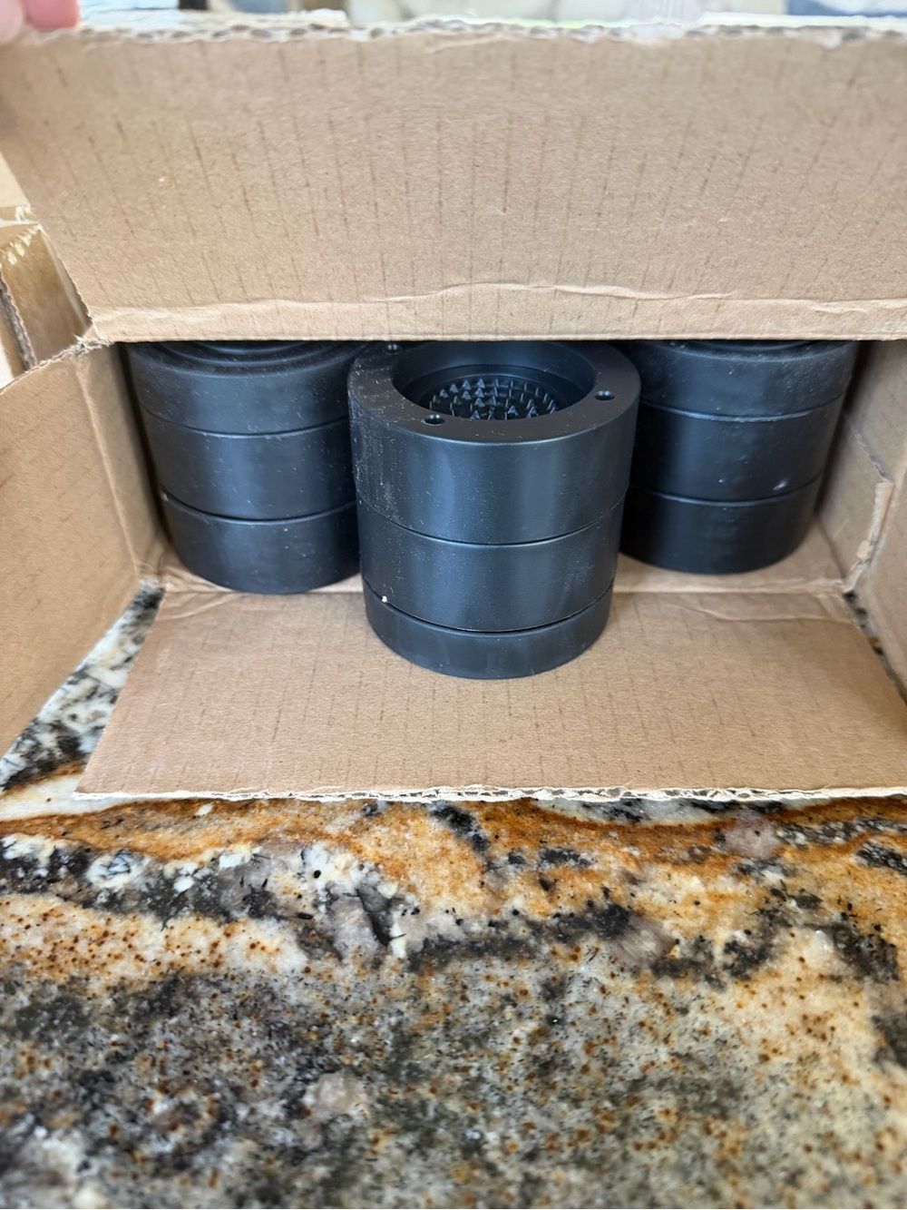 Set of Black Furniture Riser Cups - Protective Non-Slip Home Storage Accessories